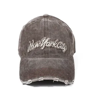 Detail of New York City embroidered patch on vintage washed cotton baseball cap