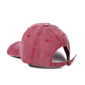 Vintage washed red cotton baseball cap with adjustable metal buckle and six-panel design