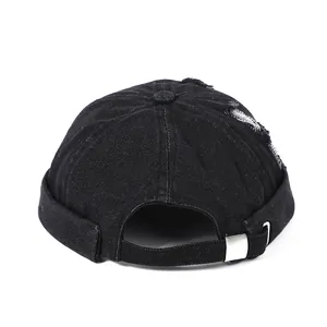 Black denim miki hat with distressed holes and adjustable silver buckle back view