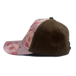 Detail view of a Capybara print baseball cap with brown canvas and purple brim design