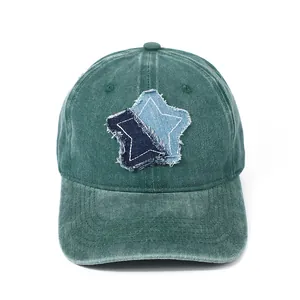 Detail of vintage washed baseball cap with distressed star patches and contrast stitching