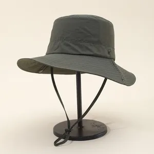 Detail of dark army green quick-dry sun hat with wide brim and adjustable chin strap