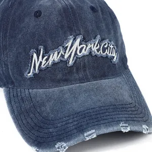 Distressed dark blue New York City washed denim baseball cap with vintage embroidery