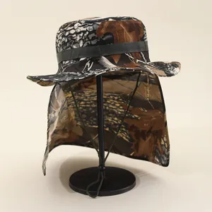 Detail of leaf camouflage sun hat with neck flap and adjustable chin strap