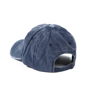 Detail of vintage washed cotton navy baseball cap with adjustable metal back buckle