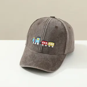 Washed dark grey kids baseball cap featuring colorful train embroidery for sun protection