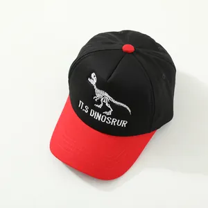 Kids baseball cap featuring a white dinosaur skeleton embroidery and red brim