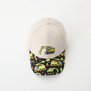 Kids baseball cap with yellow excavator embroidery and colorful cartoon brim print