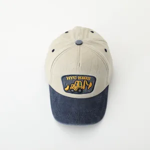 Kids baseball cap featuring cartoon excavator embroidery with contrast color design