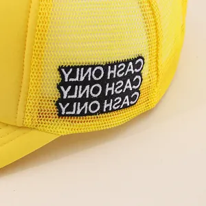 Yellow mesh trucker hat with Gas Service Cash Only embroidery on a side view profile