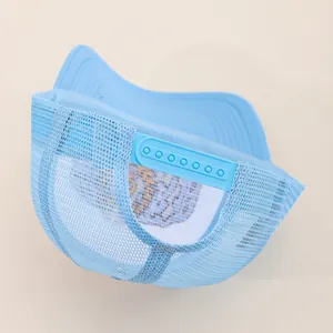 Light blue embroidered trucker hat featuring breathable mesh and adjustable strap back