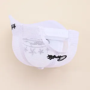 White mesh truck cap featuring black embroidery and adjustable snapback closure