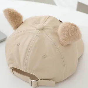 Kids beige cotton baseball cap featuring 3D plush brown ears and adjustable metal buckle