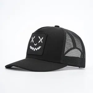 Black mesh trucker hat with white face embroidery and curved brim for men and women