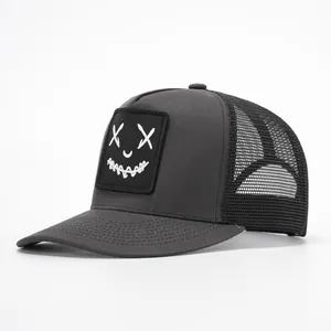 Dark grey trucker hat with smile face embroidery and black mesh back for men and women