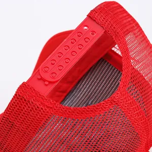 Red snapback trucker hat with breathable mesh back and adjustable strap closure