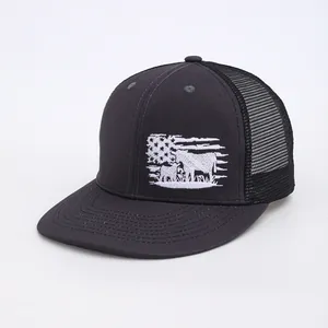 Close-up of black breathable mesh trucker hat featuring a cow silhouette flag embroidery
