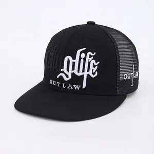 Close-up of white g-life and OUTLAW 3D embroidery on black mesh trucker baseball hat