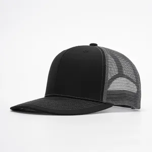 Side view of two-tone mesh trucker hat with black front panel and grey breathable net