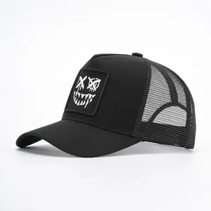 Breathable black mesh trucker hat with graffiti smile embroidery and curved brim