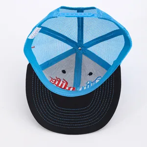 Two-tone mesh trucker hat with breathable blue mesh and embroidered black brim