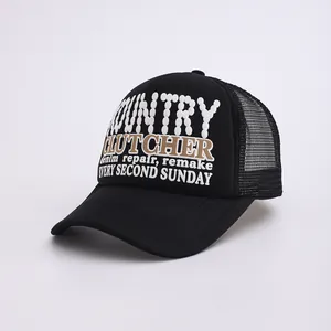 Casquette trucker noire rétro avec filet et lettrage vintage country imprimé baseball