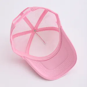 Breathable pink mesh trucker hat for men and women with adjustable back closure