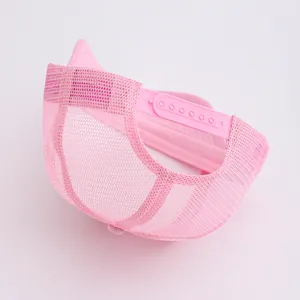 Adjustable pink trucker hat with breathable mesh back and solid brim for unisex style