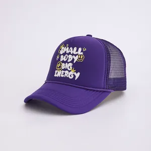 Detail of purple trucker hat with smile face and Small Body Big Energy printed slogan