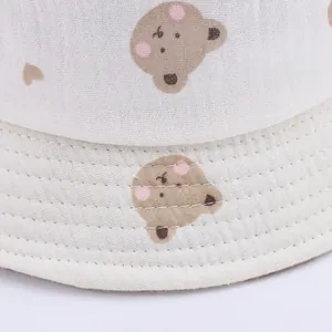 Toddler sun hat featuring cute brown bear prints on premium white cotton gauze fabric