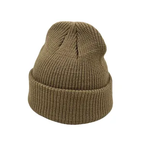 Detailed view of the thick ribbed knit texture on a dark coffee beanie hat for winter