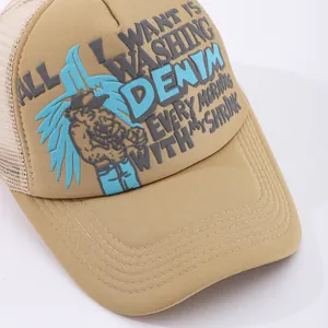 Macro detail of 3D puff print lettering on breathable mesh trucker baseball cap