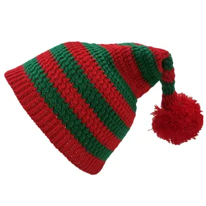 Red and green striped Christmas knit elf hat with a large red pompom on white background