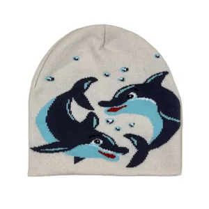 Knit beanie with dolphin jacquard pattern on a beige winter warm casual hat
