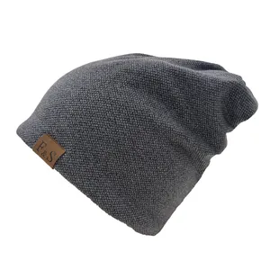 Dark gray waffle knit beanie hat with premium brown leather brand label for sports