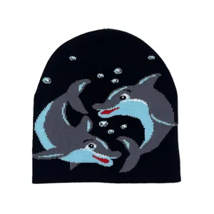 Black knit beanie featuring symmetrical dolphin jacquard pattern and white bubble details