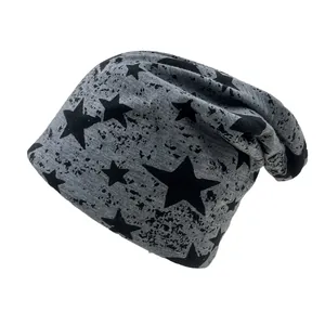Grey knitted slouchy beanie with black star pattern for autumn and winter outdoor warmth