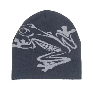 Unisex grey knitted beanie featuring creative jacquard pattern in a casual winter style