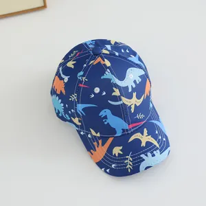 Kids navy baseball cap featuring colorful cartoon dinosaurs for sun protection