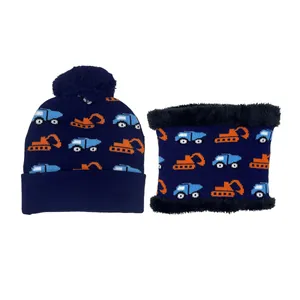 Kids navy knit hat and scarf set with excavator pattern and fluffy pom-pom detail