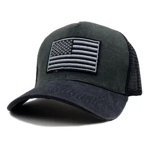 Detail of grey baseball cap with monochrome USA flag patch and breathable mesh back