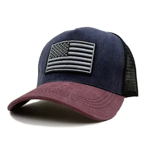 Navy and burgundy trucker hat with US flag embroidery and breathable black mesh back