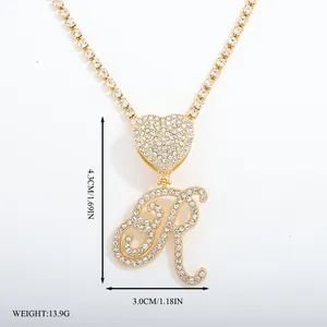 Gold iced out heart letter R pendant on tennis chain with dimensions 4.3x3.0cm