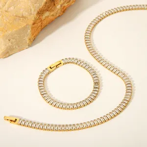 Detail of 18K gold plated tennis chain set with micro-pave rectangular cubic zirconia