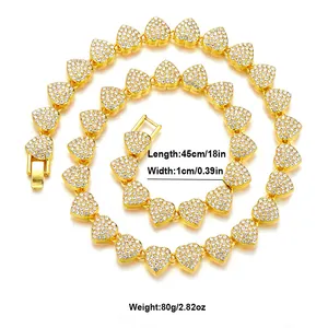 Detail of gold iced-out heart link necklace with micro-pave crystals and secure clasp
