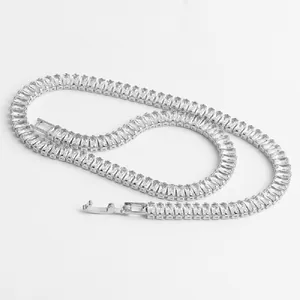 Detail view of silver tennis chain with rectangular cubic zirconia and secure folding clasp