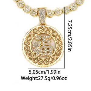 Close-up showing dimensions of the gold alloy Fu character pendant with inset crystals