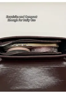 Internal view showing large main compartment and zipper pocket of the vintage crossbody bag