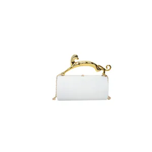Elegant white cylinder evening bag with gold leopard handle and thin chain strap
