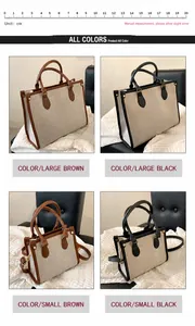 Detail view of large and small woven canvas Paris tote bags in brown and black colors